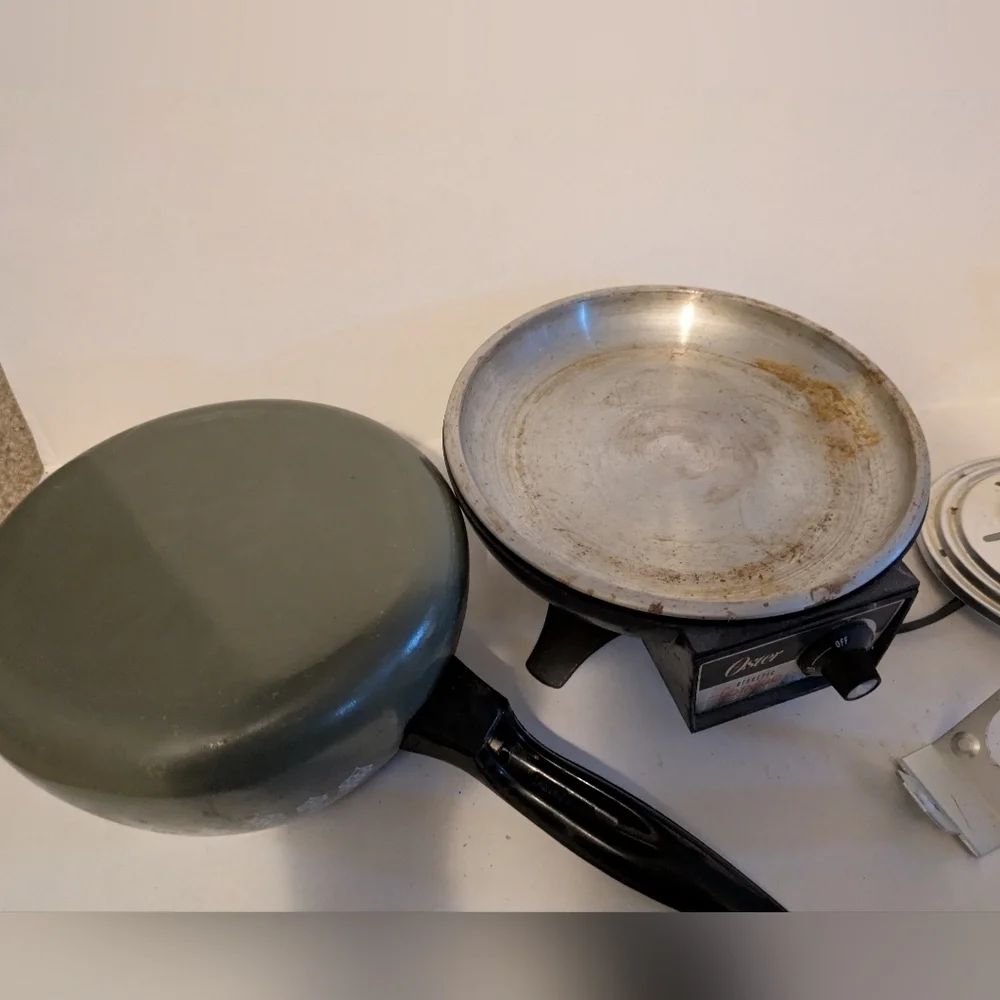 Vintage Oster Electric Fondue Set with forks.